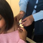 Nandile Yani gets her flu shot in Cape Town. Image: ESA ALEXANDER